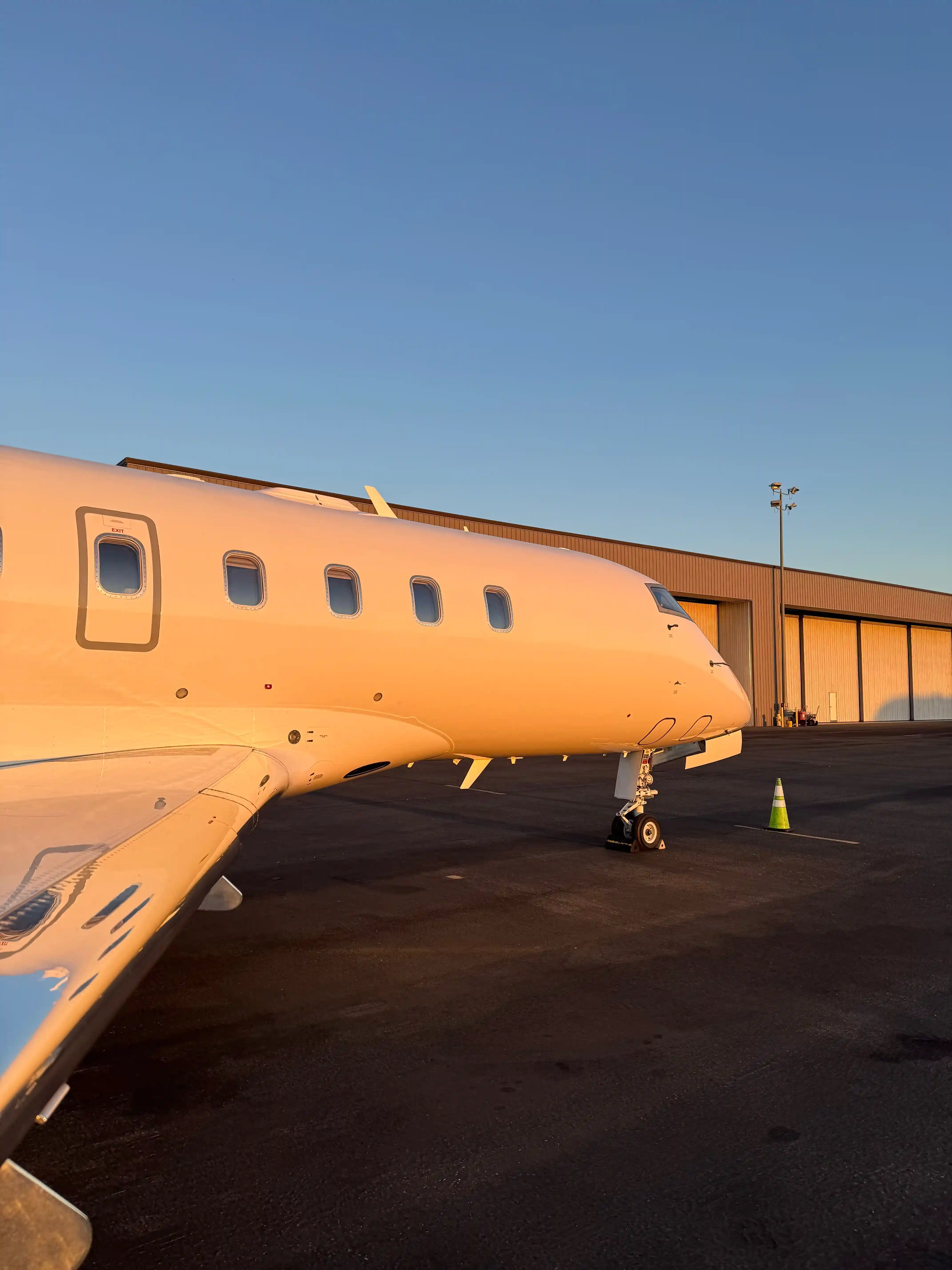 Business jet on the ramp at sunset before pre-embarkation disinsection for a US departure to Uruguay