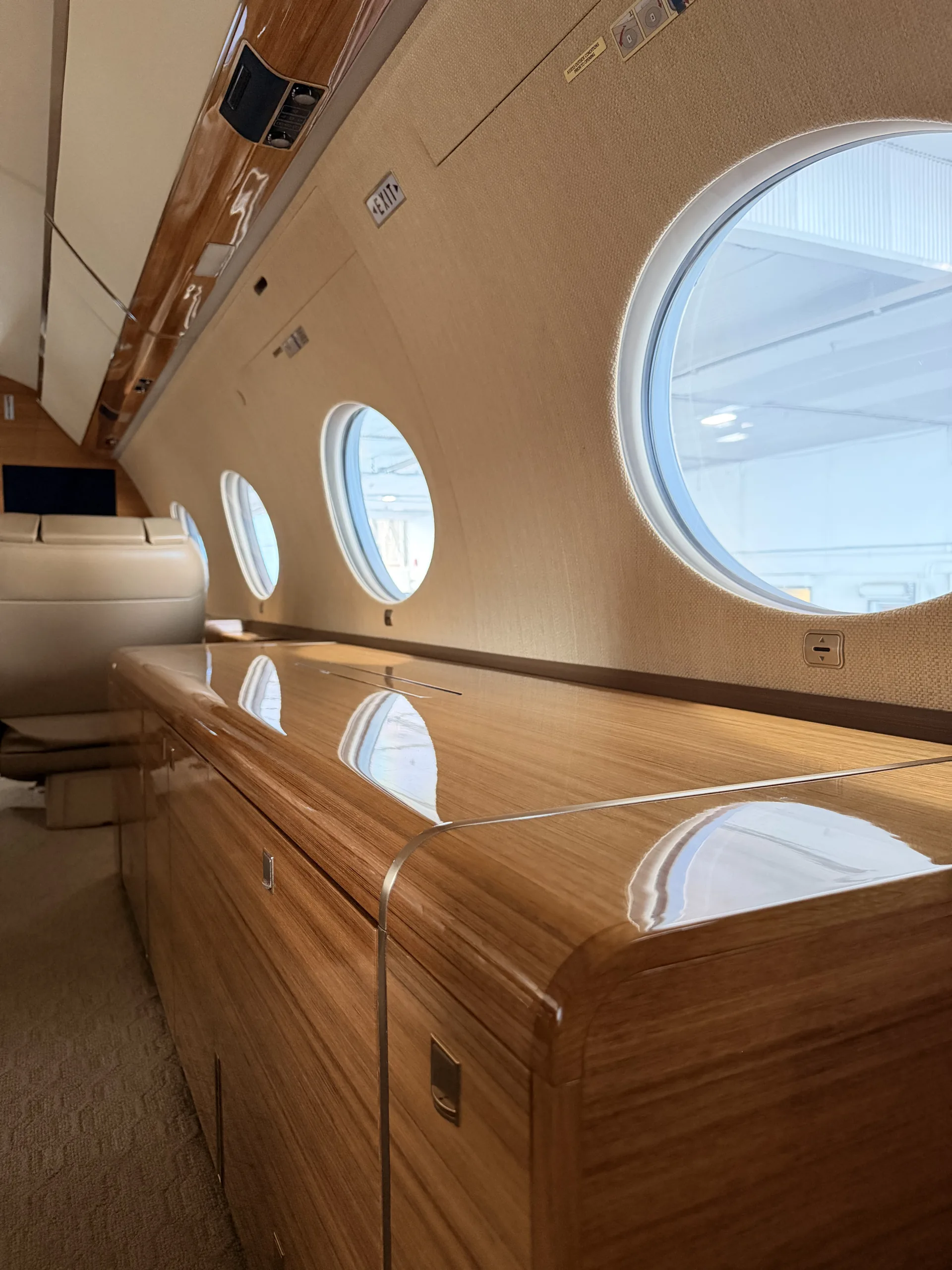 Business jet cabin, empty before boarding, ready for pre-embarkation aircraft disinsection at BED in Bedford, Massachusetts