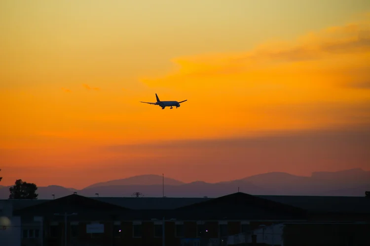 Aircraft on approach at sunset in Jamaica